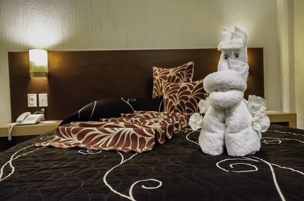 Hotel Petit Tehuacán Rum bild